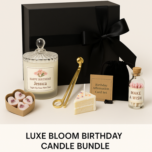 Luxury birthday candle gift bundle including soy candle, wax melts, mini cake candle, gold wick trimmer, affirmation cards, and match jar in a black box